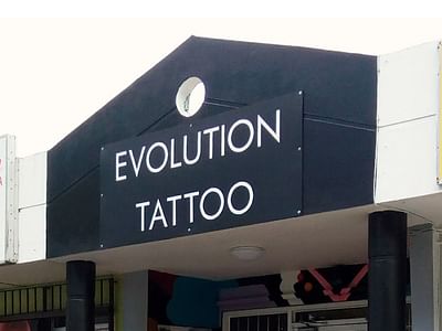 Evolution Tattoo